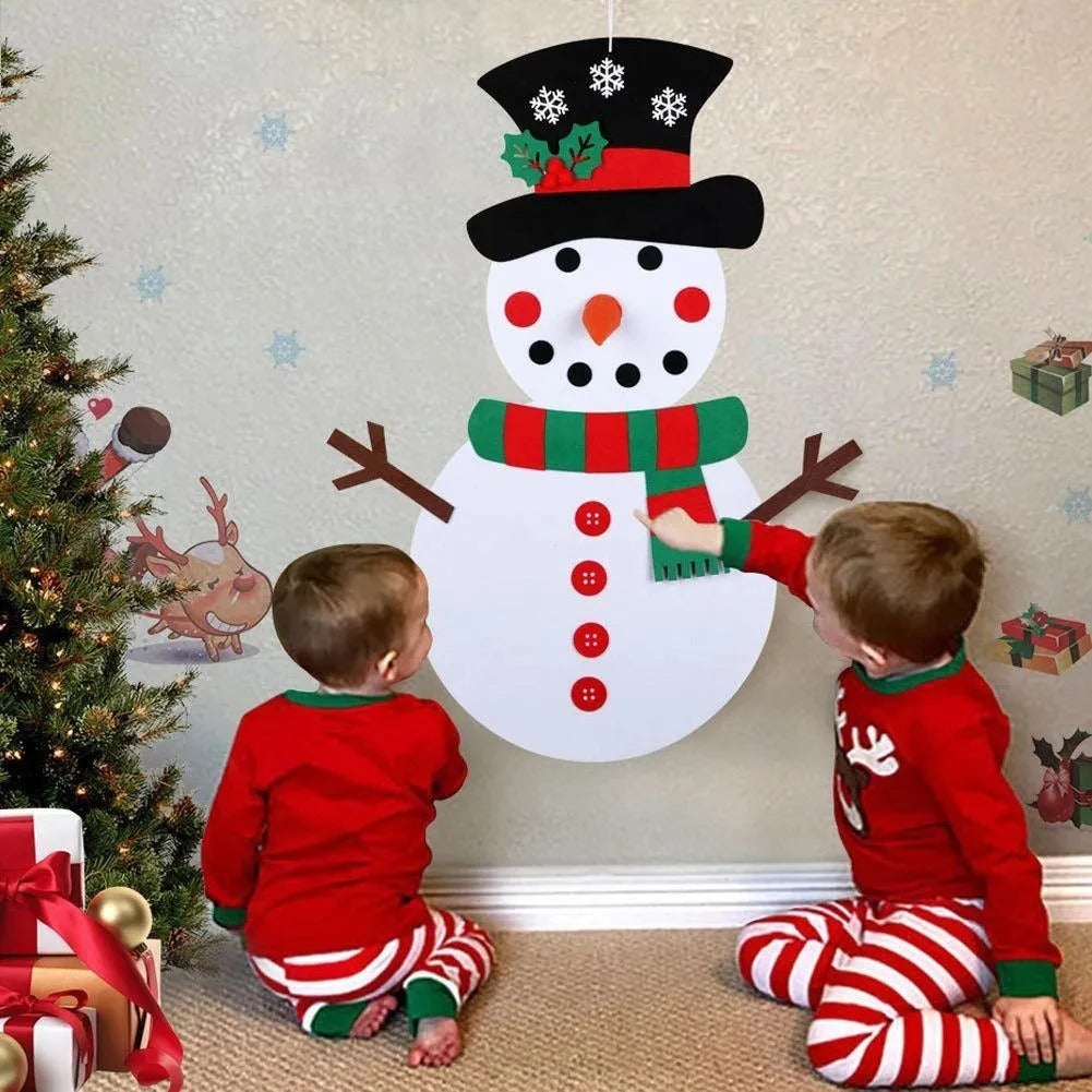 Les enfants créent leur propre Bonhomme de Neige de Noël.