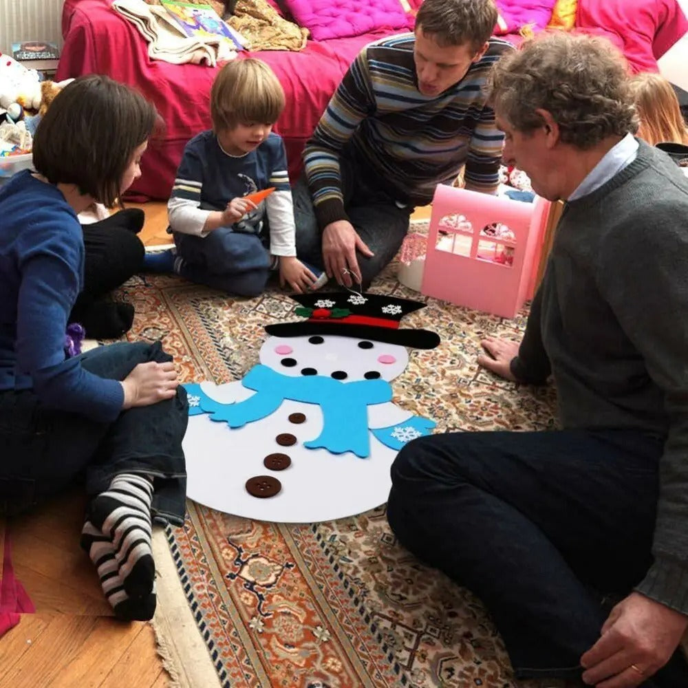 Les enfants créent leur propre Bonhomme de Neige de Noël.